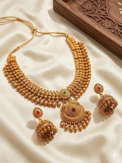 Gold-Plated Antique Temple Jewellery Set for Women - Traditional Necklace with Large Peacock Pendant & Matching Jhumka Earrings | Ethnic Festive & Bridal Wear Set with Ruby & Emerald Accents
